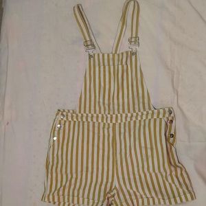 A short pair of overalls.